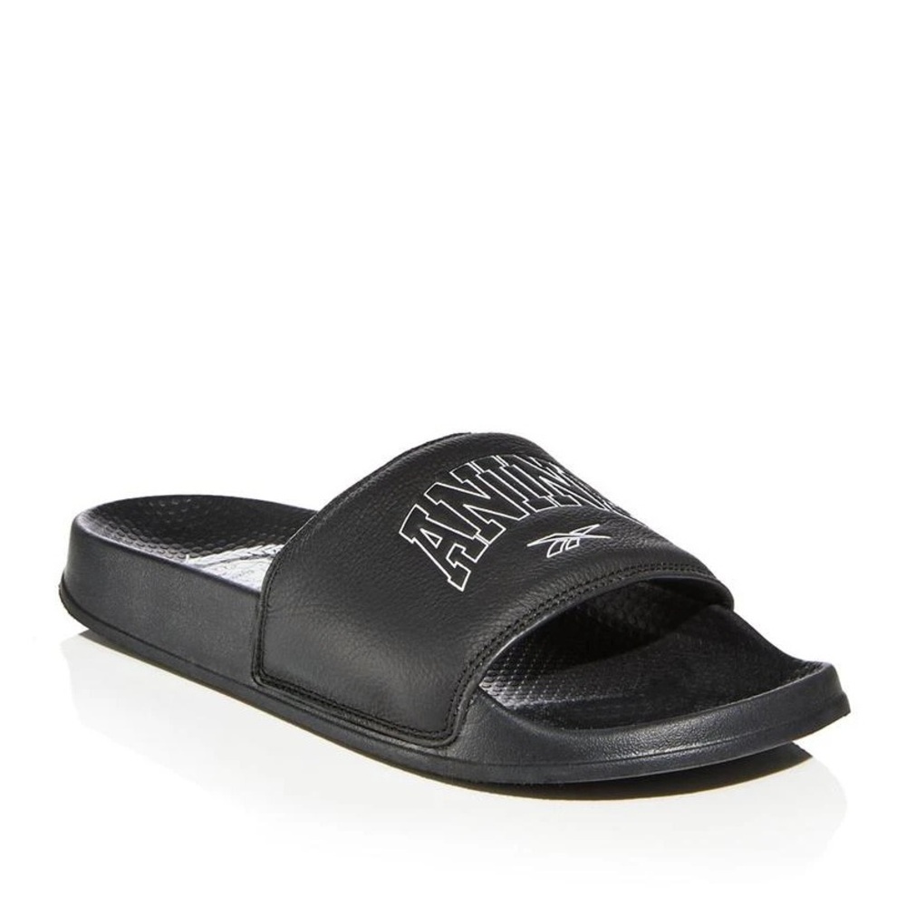 Reebok
x Anine Bing Slides
